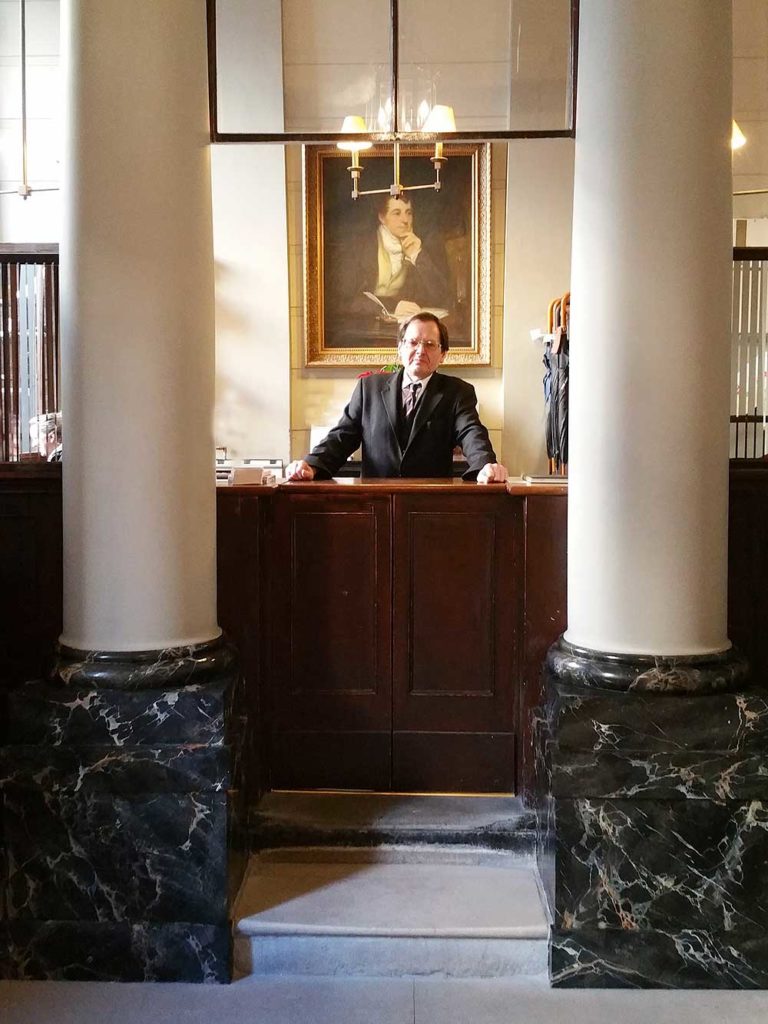 Hand painted black & gold faux marble design in the Travellers Club foyer (Clive on duty) - Pall Mall.